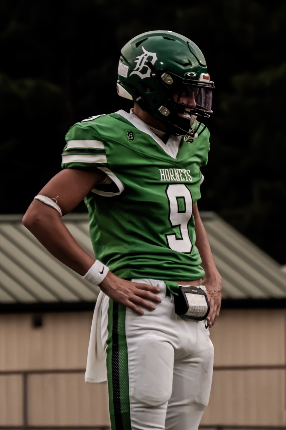 Dixie Hornets number 9 on the sideline